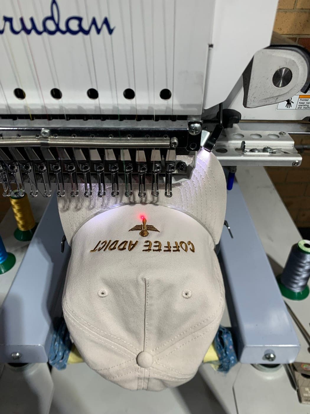 Embroidery running on our Barudan machine